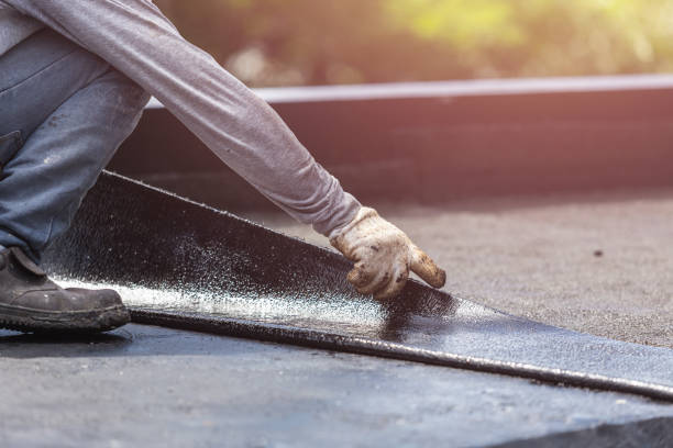 Professional Basement Waterproofing technician working in Rochester, PA